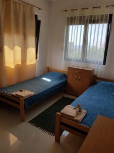 Postel nebo postele na pokoji v ubytování Villa Persik