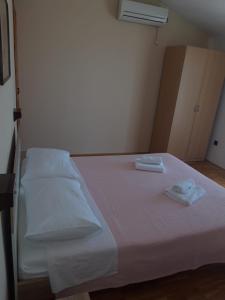 Posteľ alebo postele v izbe v ubytovaní Relax Ravni