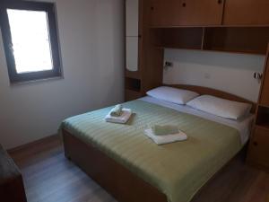 Posteľ alebo postele v izbe v ubytovaní Relax Ravni + 21 fotografií
