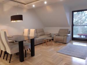 Posedenie v ubytovaní Apartamenty przy Stoku Mrągowo