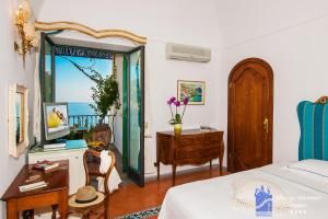 Albergo Miramare Positano客房内的一张或多张床位
