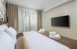 Posteľ alebo postele v izbe v ubytovaní Val di Sole