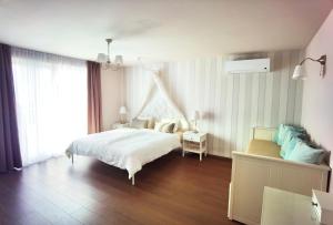 Postel nebo postele na pokoji v ubytování Guesthouse Olei