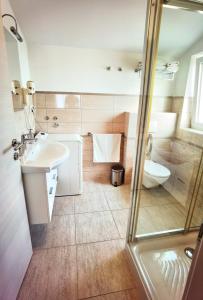 Vannituba majutusasutuses Guesthouse Olei