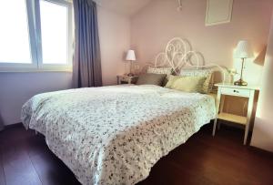 Postel nebo postele na pokoji v ubytování Guesthouse Olei