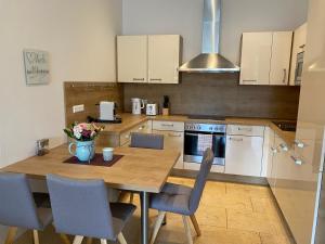 Kuchyňa alebo kuchynka v ubytovaní Adria Villa Apartment