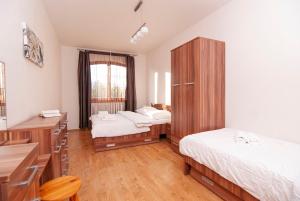 Posteľ alebo postele v izbe v ubytovaní Apartmany Sileas