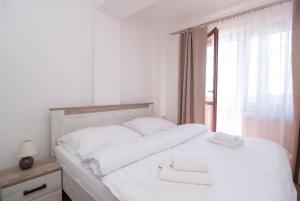 Posteľ alebo postele v izbe v ubytovaní Apartmany Sileas