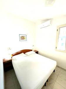 Кровать или кровати в номере Residence Palm Garden
