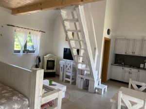 Televízia a/alebo spoločenská miestnosť v ubytovaní Apartment I&M