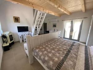 Televízia a/alebo spoločenská miestnosť v ubytovaní Apartment I&M