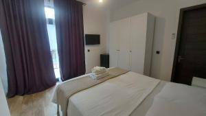 Letto o letti in una camera di Level Up Hotel & Restaurant