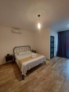 Letto o letti in una camera di Level Up Hotel & Restaurant