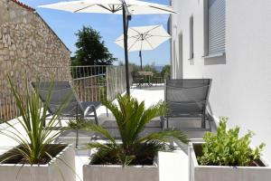 Balkon lub taras w obiekcie Buric House - Apartments Klasik and Studio Mini
