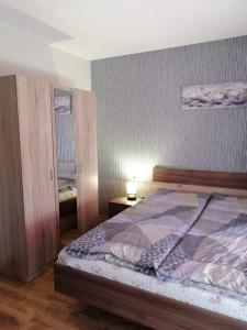 A bed or beds in a room at Byala-apartment-valmira Még 37 kép