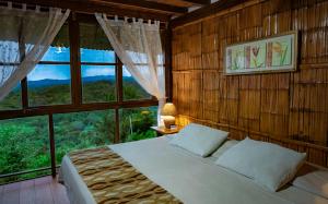 Postel nebo postele na pokoji v ubytování Samai Lodge Holistic Living