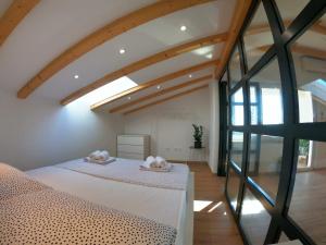 Ein Bett oder Betten in einem Zimmer der Unterkunft Sun-drenched apartment ''The View''