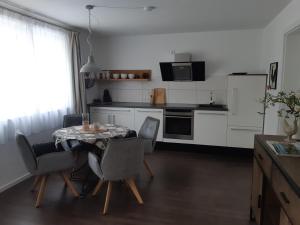 Kuchyň nebo kuchyňský kout v ubytování Appartement FreiRaum