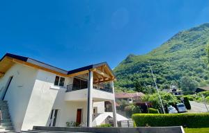 a house with a view of a mountain at Cosy for You in Annecy