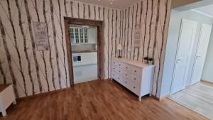 Kuchyň nebo kuchyňský kout v ubytování Kivi Residence