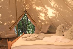 Postel nebo postele na pokoji v ubytování Boutique B&B Agroturizam Sv. Juraj