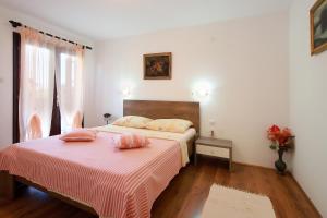 Postel nebo postele na pokoji v ubytování Apartmani Svoboda