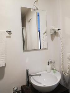 Koupelna v ubytování Hotel Valentino