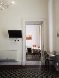 TV a/nebo společenská místnost v ubytování Hotel Valentino