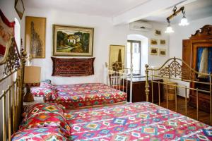 Posteľ alebo postele v izbe v ubytovaní PONTINOS OLD HOUSE