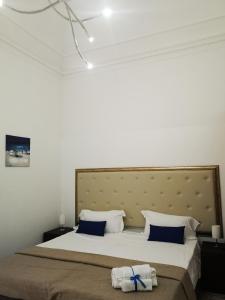 Postel nebo postele na pokoji v ubytování Hotel Valentino