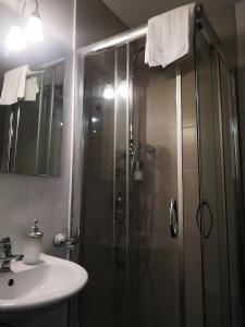 Koupelna v ubytování Hotel Valentino