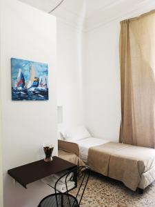 Postel nebo postele na pokoji v ubytování Hotel Valentino
