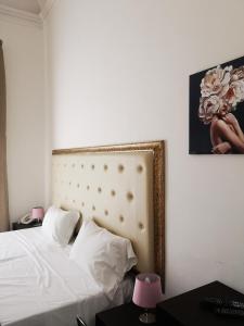 Postel nebo postele na pokoji v ubytování Hotel Valentino