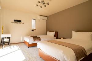 Letto o letti in una camera di Fuji Gran Villa - TOKI -