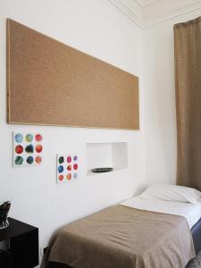 Postel nebo postele na pokoji v ubytování Hotel Valentino
