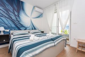 Postel nebo postele na pokoji v ubytování Lavanda 2 + 35 fotografií