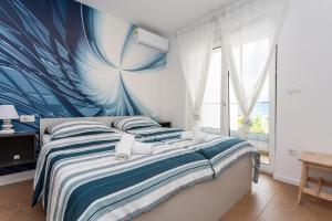 Postel nebo postele na pokoji v ubytování Lavanda 2