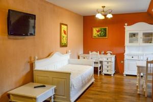 Posteľ alebo postele v izbe v ubytovaní Karczma Regionalna Hotel GOŚCINNA CHATA