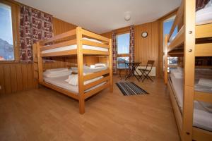 Postel nebo postele na pokoji v ubytování Tignousa logement de groupes et individuels + 12 fotografií