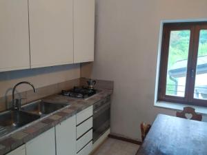 Kuchyň nebo kuchyňský kout v ubytování Agriturismo Val di Ferro