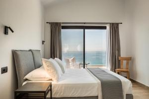 Postel nebo postele na pokoji v ubytování Mystique View Villas + 37 fotografií
