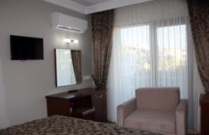 TV a/nebo společenská místnost v ubytování Keyf Konak Boutique Hotel