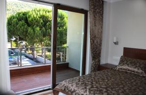 Postel nebo postele na pokoji v ubytování Keyf Konak Boutique Hotel