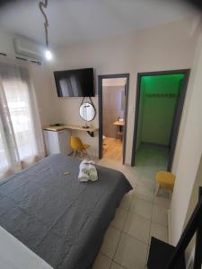 Poseidon Rooms客房内的一张或多张床位