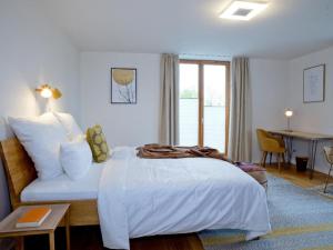 Кровать или кровати в номере Kraftquelle Waldhäuser