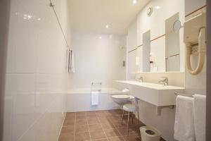 Vannituba majutusasutuses Hotel Monaco Zeebrugge Beach by Rikas Hotels
