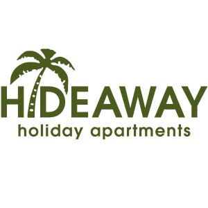 a palm tree logo with the words holidays holiday apartments at HideAway in Anse Possession
