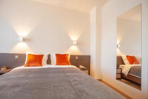 Voodi või voodid majutusasutuse Hotel Monaco Zeebrugge Beach by Rikas Hotels toas