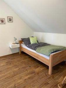 Postel nebo postele na pokoji v ubytování Jahn Apartments