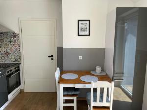 Kuchyň nebo kuchyňský kout v ubytování Jahn Apartments
